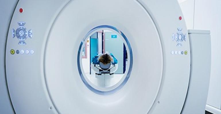 MRI machine about to take in patient