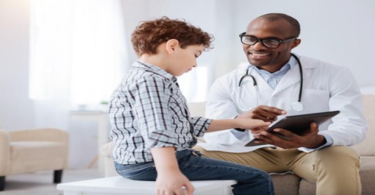 doctor talking to a kid