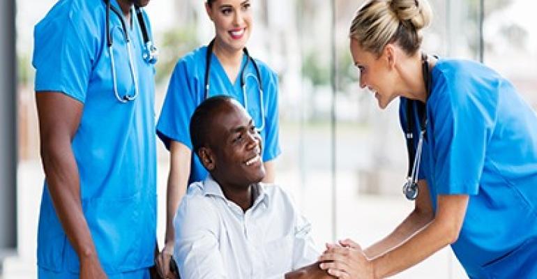 doctors shaking a patient's hands